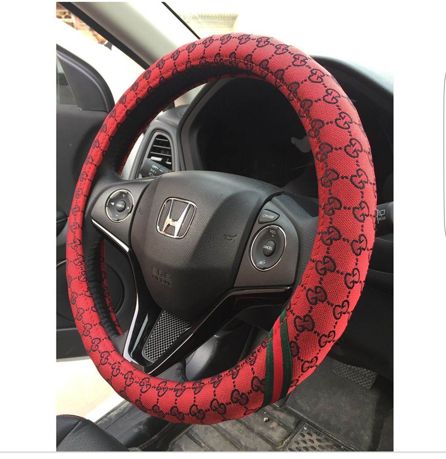 Slaycar Accessories - Multiple coloured LV and Gucci steering wheel cover  for that Pop of colour to your car interior . .Price 4,500 . . Visit Plot  60 Oredola Olojo Street by